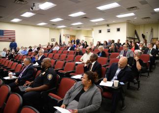Community members attending the 'Combating Hates Crimes in New Hampshire' seminar hosted by the New Hampshire Department of Safety.